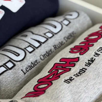 Close-up of a textured surface bookish sweatshirt embroidery