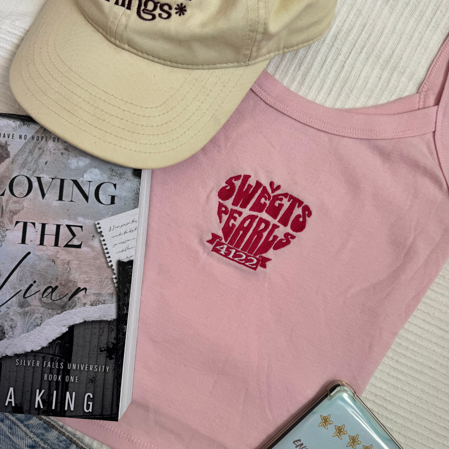 Loving the Liar embroidered tank top flat lay