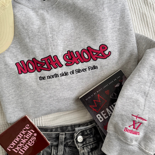 North Shore embroidered sweatshirt flat lay inspired by Lola King
