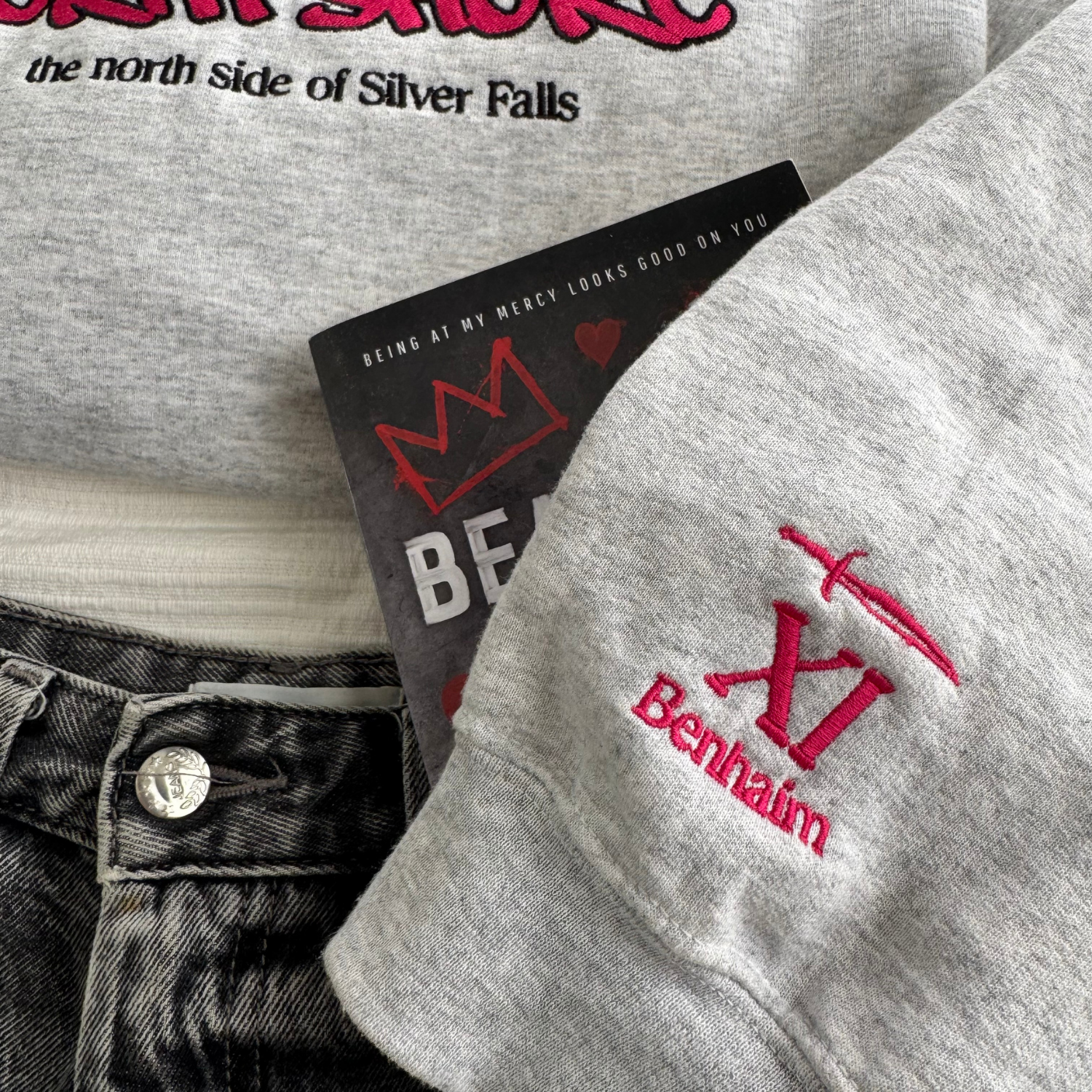 Xi Benhaim North Shore embroidered sweatshirt close up flat lay inspired by Heartless Beloved from Lola King