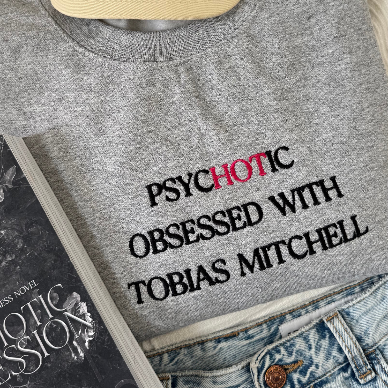 Psychotic Obsessed with Tobias Mitchell embroidered sweatshirt flat lay inspired by Leigh Rivers Psychotic Obsession merch