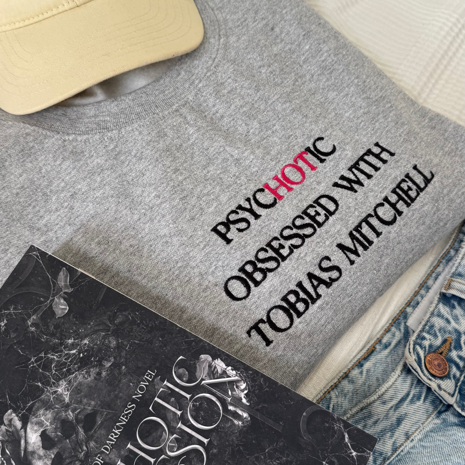 Psychotic Obsessed with Tobias Mitchell embroidered sweatshirt flat lay inspired by Leigh Rivers