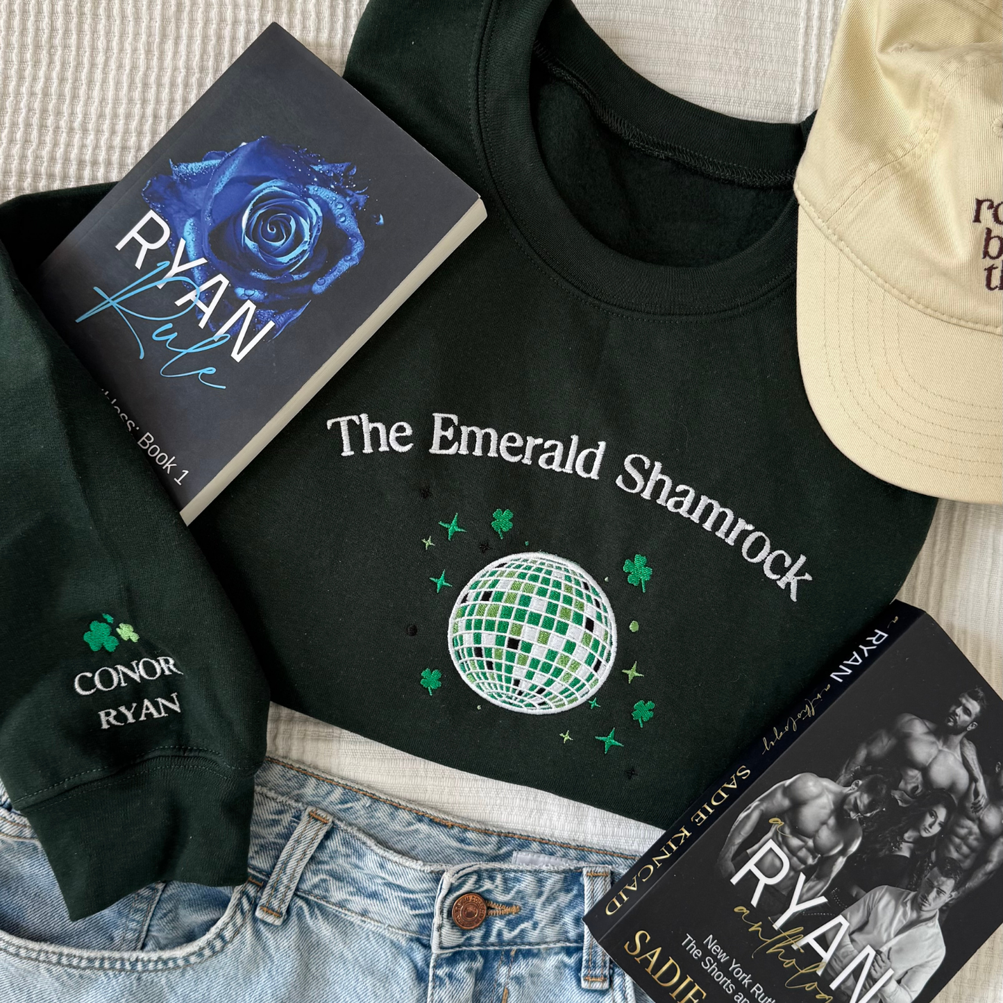 Emerald Shamrock embroidered sweatshirt flat lay inspired by Sadie Kincaid