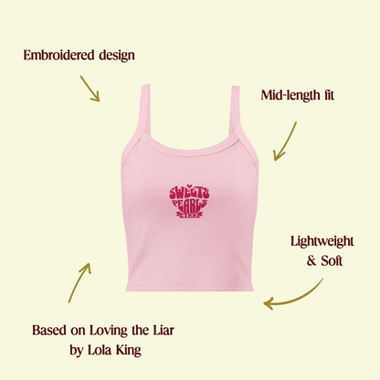Loving the Lair tank top shown with features like breathable fabric, mid-length fit and embroidered heart